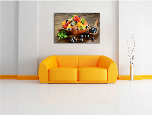 Schale voll mit frischem Obst Leinwandbild über Sofa