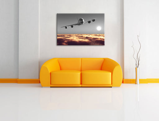 Flugzeug über Wolkenmeer Leinwandbild über Sofa