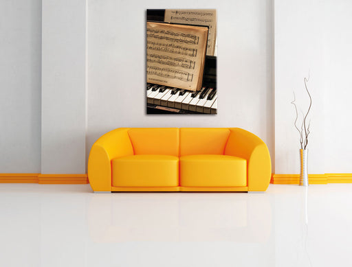 Klavier mit Notenblätter Leinwandbild über Sofa