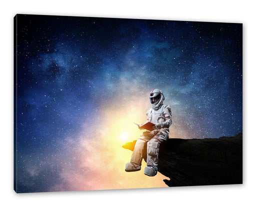 Lesender Astronaut auf Vorsprung vor Galaxie Leinwanbild Rechteckig