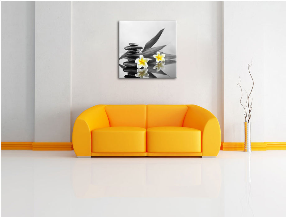 Monoi Blüten Zen Steinturm Leinwandbild Quadratisch über Sofa