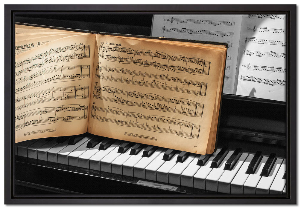 Notenbuch auf Piano auf Leinwandbild gerahmt Größe 60x40