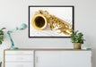 Saxophon auf Notenpapier auf Leinwandbild gerahmt verschiedene Größen im Wohnzimmer