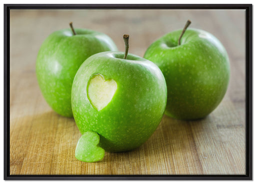 ein Herzchen im Apfel auf Leinwandbild gerahmt Größe 100x70