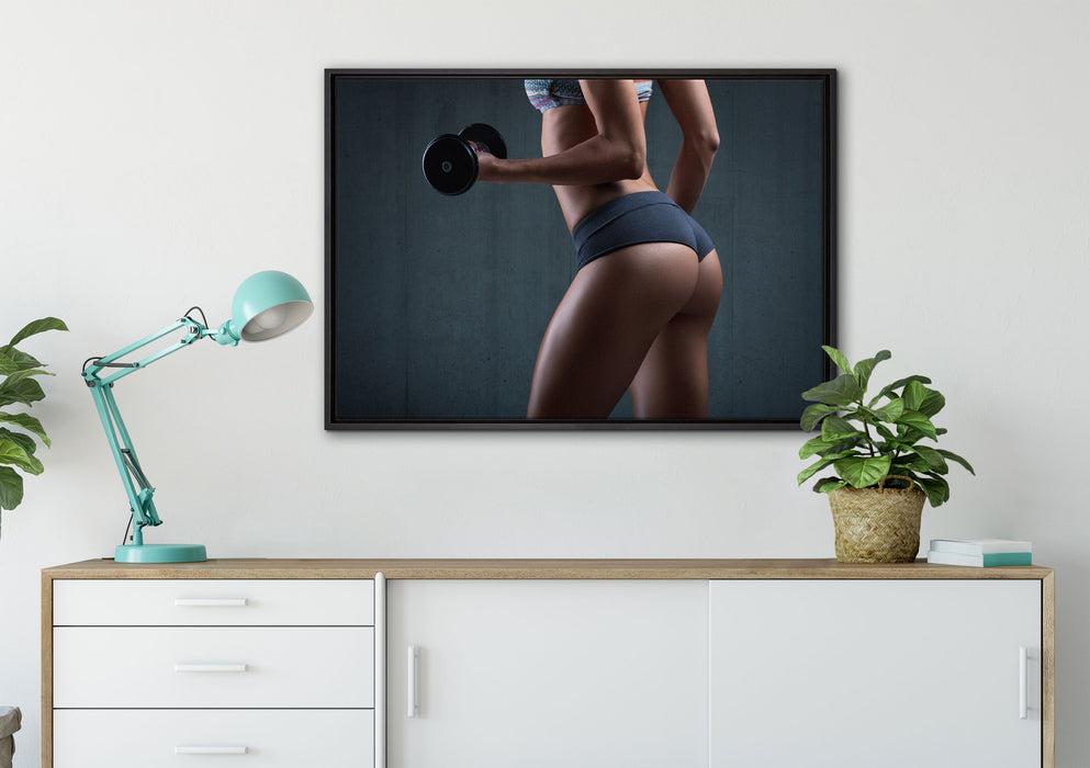 sportliche Frau mit Hanteln auf Leinwandbild gerahmt verschiedene Größen im Wohnzimmer