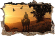 Ein Cowboy im Sonnenuntergang  3D Wandtattoo Wanddurchbruch