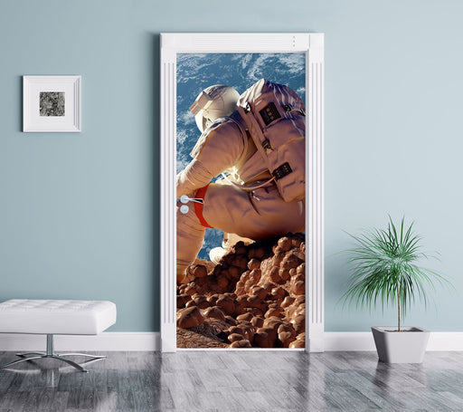 Der Astronaut Türaufkleber im Wohnzimmer