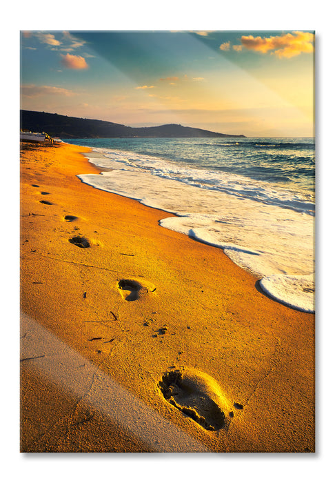 Fußabdrücke im Strand, Glasbild