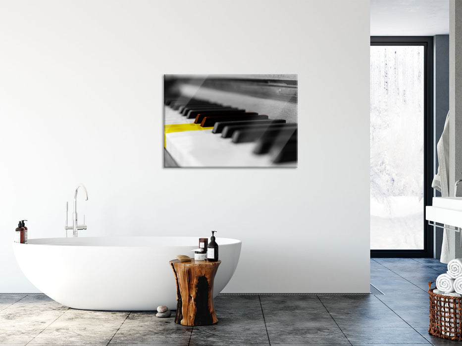 schönes Klavier mit gelben Tasten, Glasbild