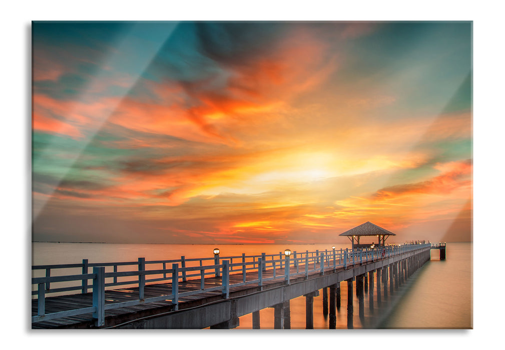 Steg ins Meer bei Sonnenuntergang, Glasbild