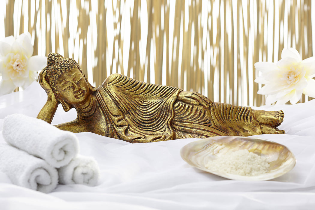 goldener Buddha auf Handtuch, Glasbild