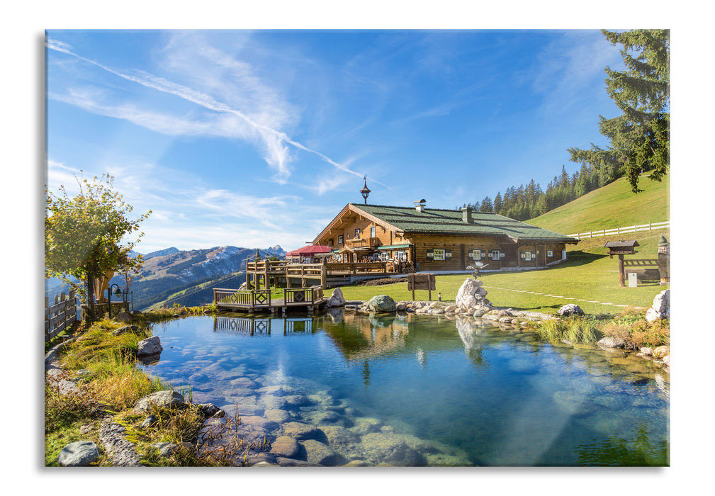 Schönes Haus in den Alpen, Glasbild