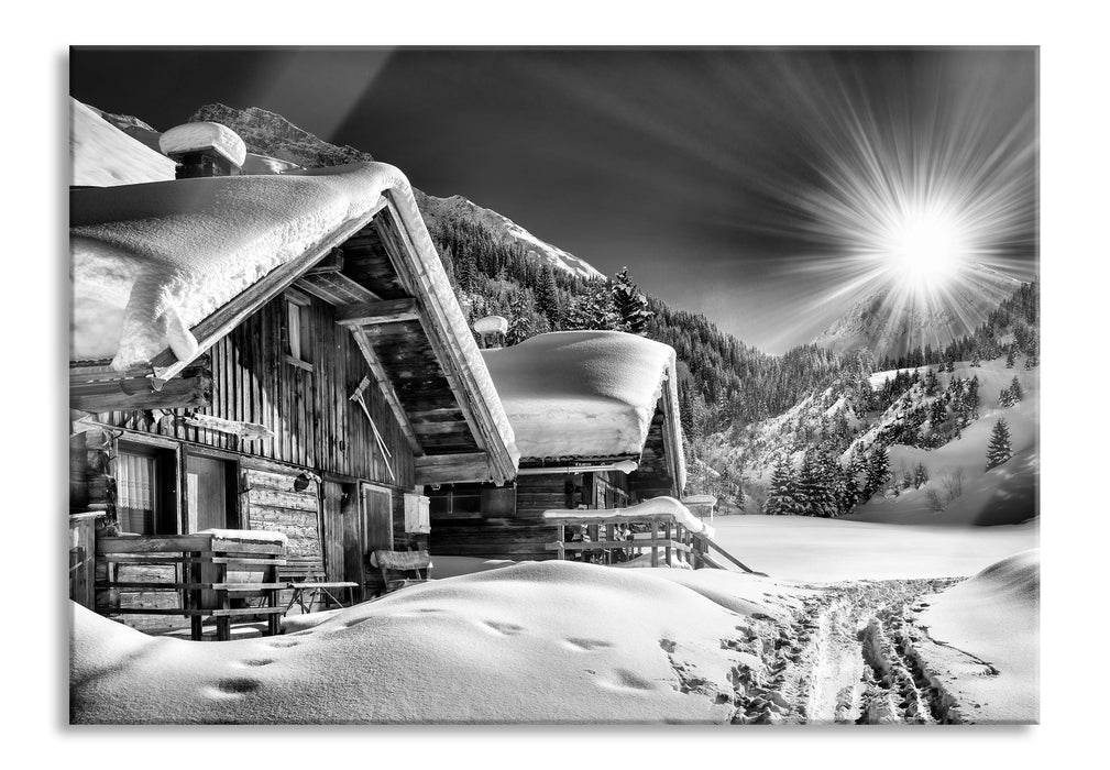 Verschneite Alpenhütte, Glasbild