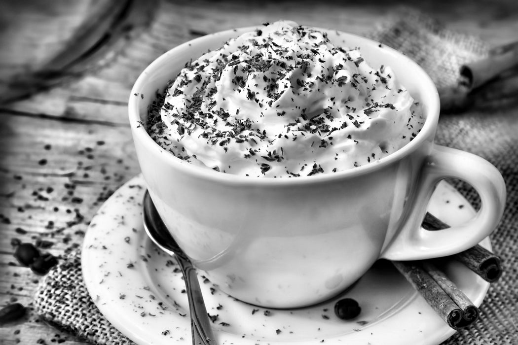 Kaffee mit viel Creme, Glasbild