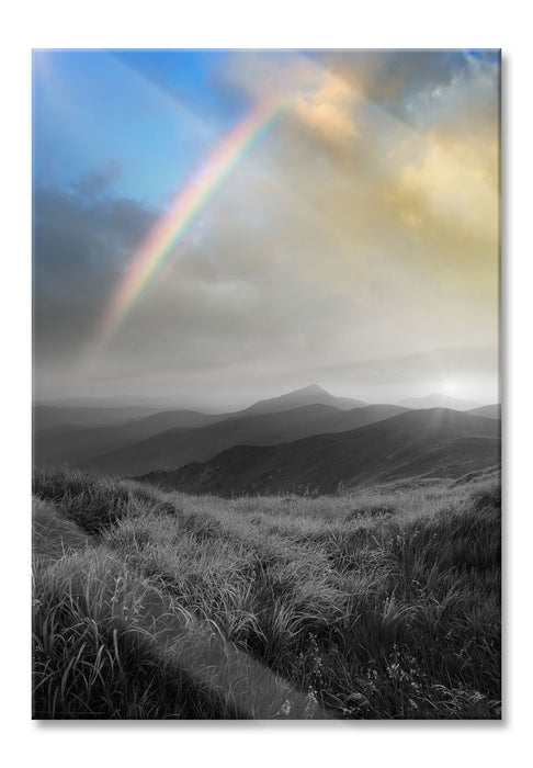 Berge mit Regenbogen am Himmel, Glasbild