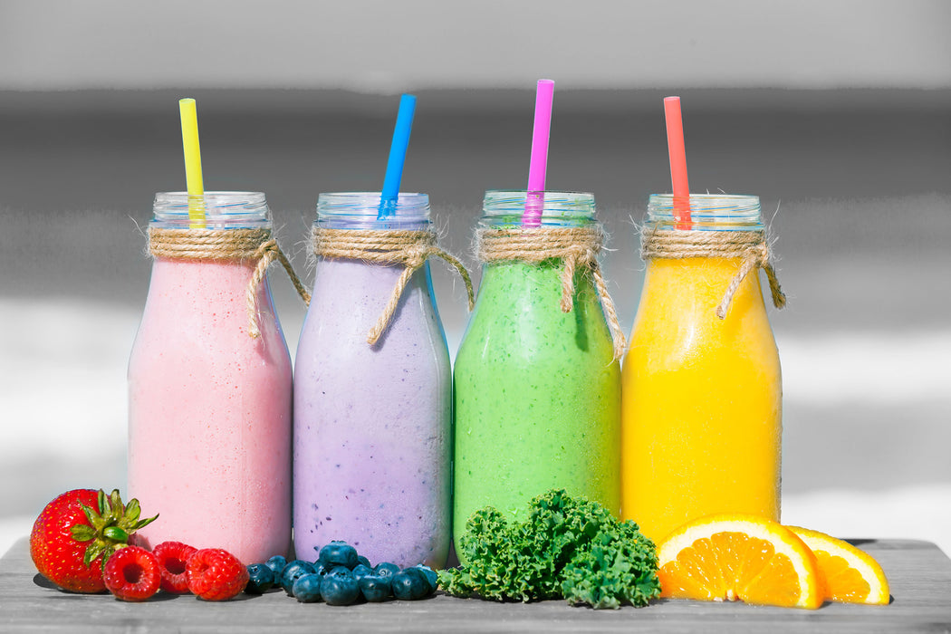 Smoothies in verschiedenen Farben, Glasbild