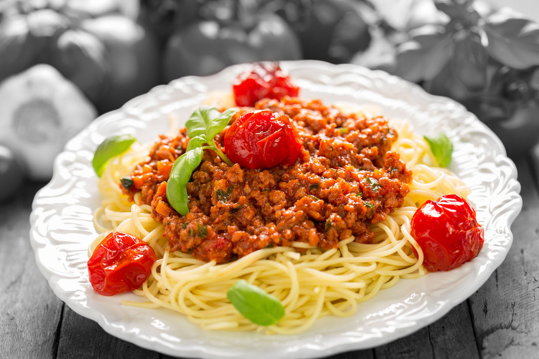 Spaghetti Bolognese auf dem Teller, Glasbild