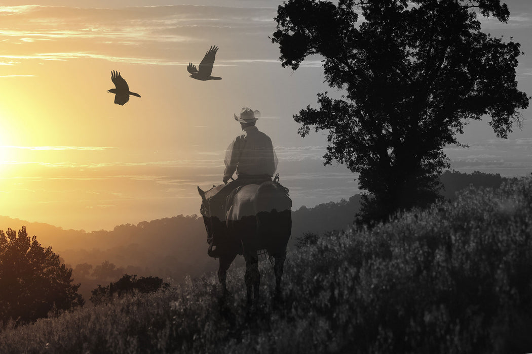 Ein Cowboy im Sonnenuntergang, Glasbild