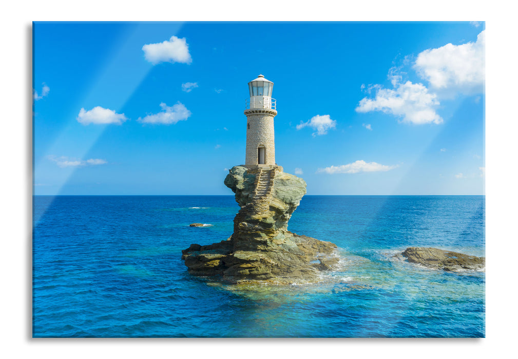 Leuchtturm auf kleiner Insel im Meer, Glasbild