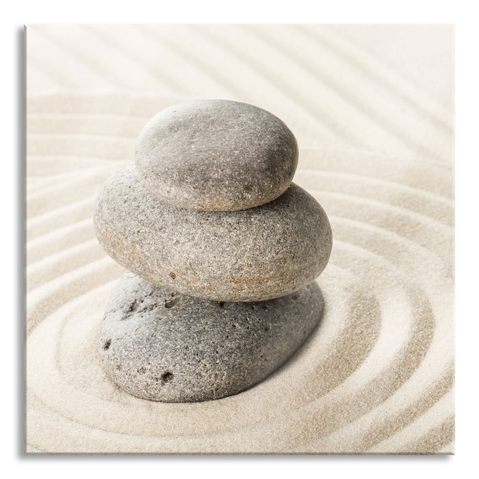 Steine in Sand mit Muster, Glasbild Quadratisch
