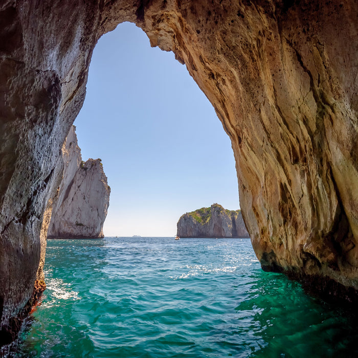 Felstor im Meer, Glasbild Quadratisch