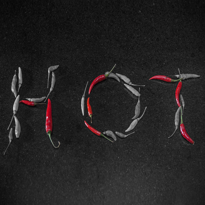 Rote scharfe Chilishoten hot, Glasbild Quadratisch