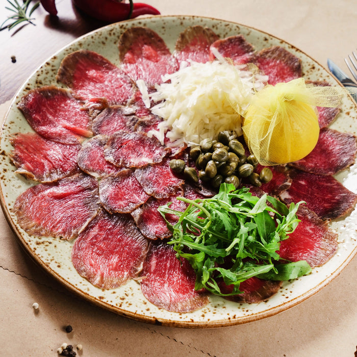 appetitliches Carpaccio, Glasbild Quadratisch