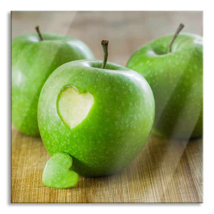 Pixxprint ein Herzchen im Apfel, Glasbild Quadratisch