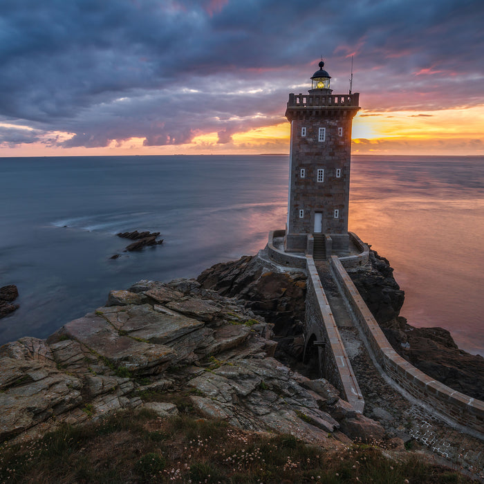 Leuchtturm im Sonnenuntergang, Glasbild Quadratisch