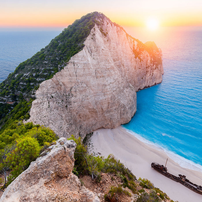 Nagio Strand im Sonnenuntergang, Glasbild Quadratisch