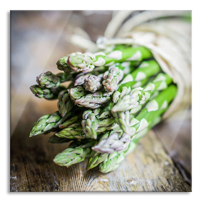 Spargel auf Holztisch, Glasbild Quadratisch