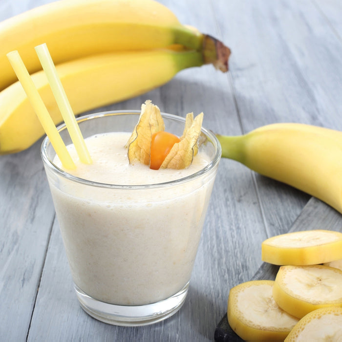 Verführerischer Bananenshake, Glasbild Quadratisch