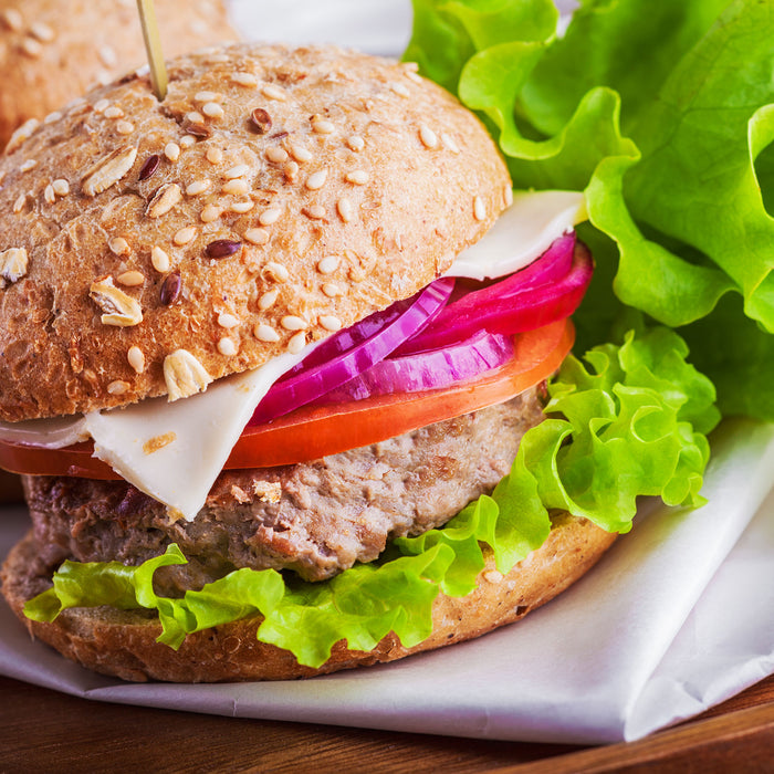 Köstlicher Hamburger, Glasbild Quadratisch