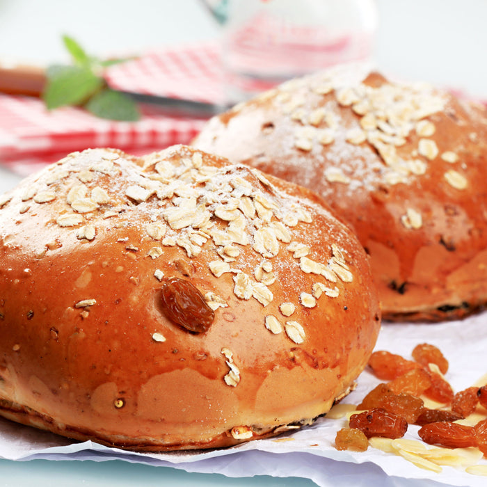 Süße Rosinenbrötchen, Glasbild Quadratisch