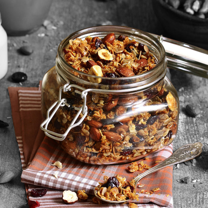 Süßes Müsli im Glas, Glasbild Quadratisch