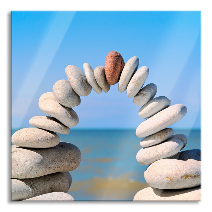 Pixxprint Brücke aus Zen Steinen am Meer, Glasbild Quadratisch