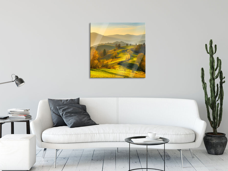 Hügelige Herbstlandschaft bei Sonnenuntergang, Glasbild Quadratisch