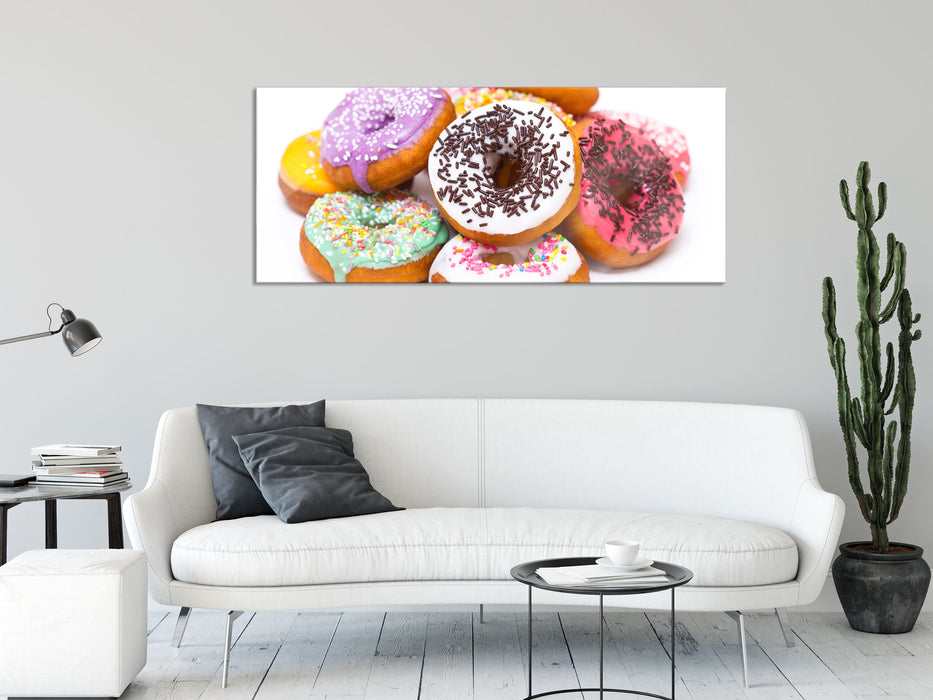 Leckere bunte Donuts, Glasbild Panorama