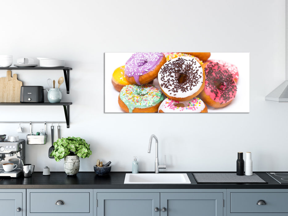 Leckere bunte Donuts, Glasbild Panorama