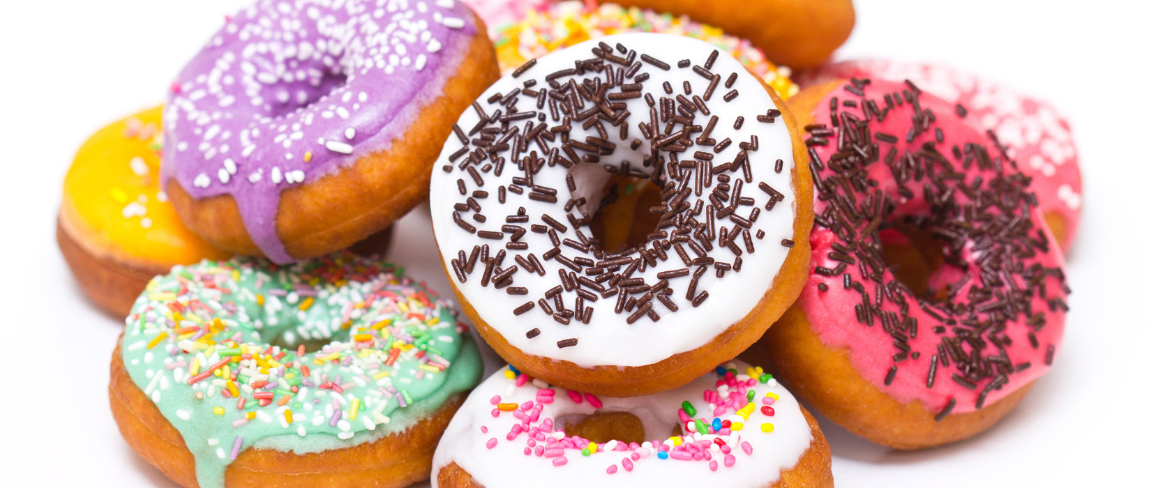 Leckere bunte Donuts, Glasbild Panorama