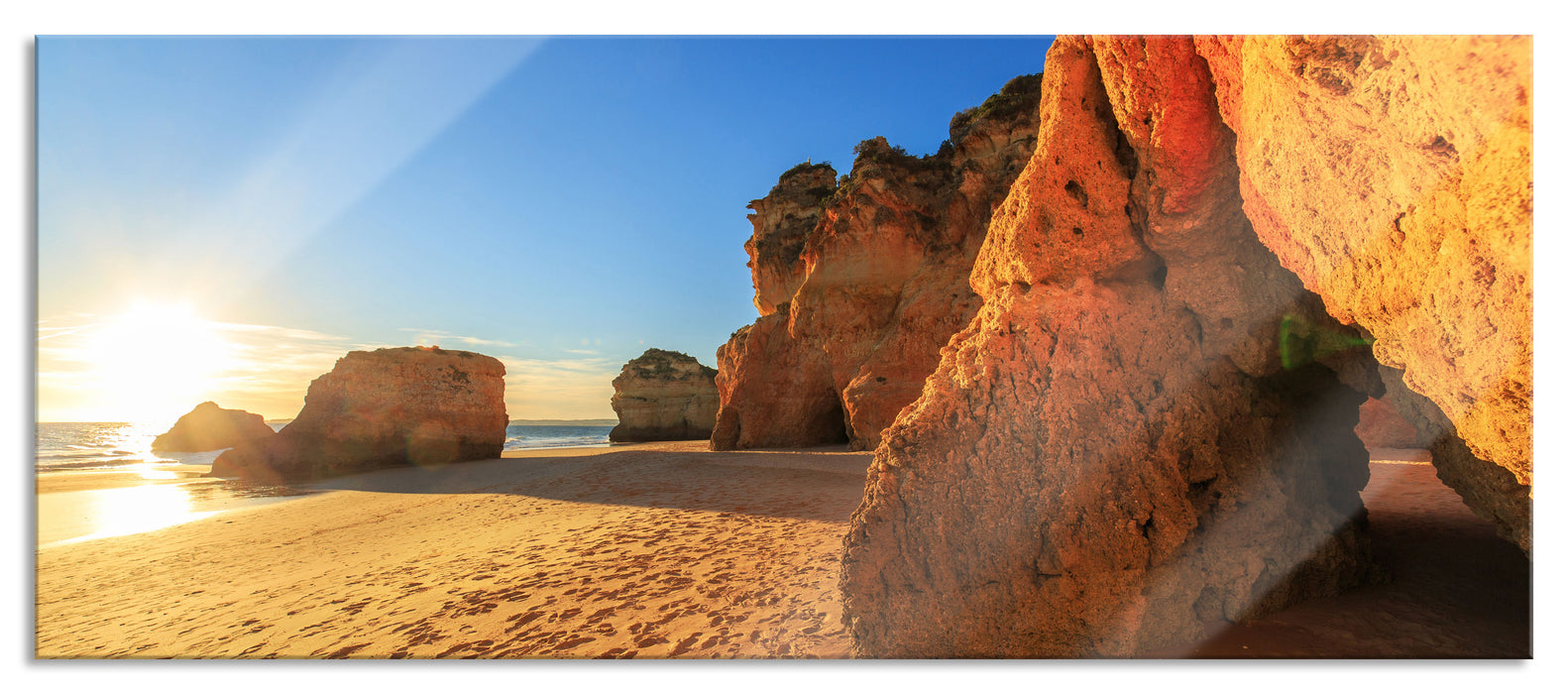 Pixxprint Sonnenuntergang an Felsen, Glasbild Panorama