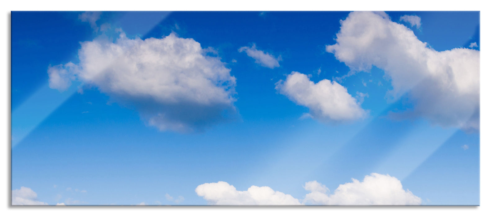 Wolken am blauen Himmel, Glasbild Panorama