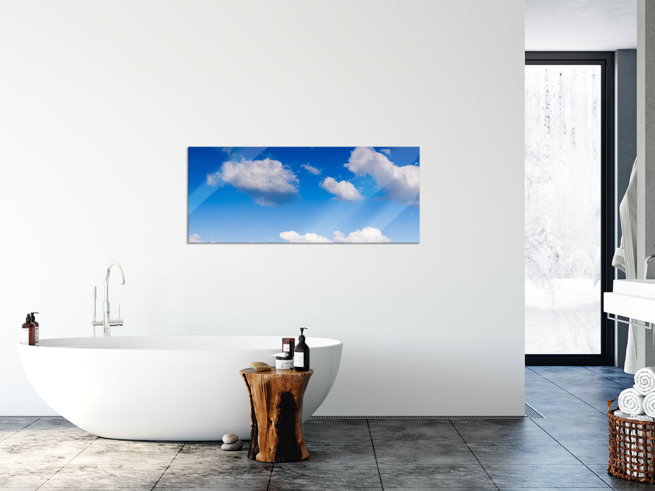 Wolken am blauen Himmel, Glasbild Panorama