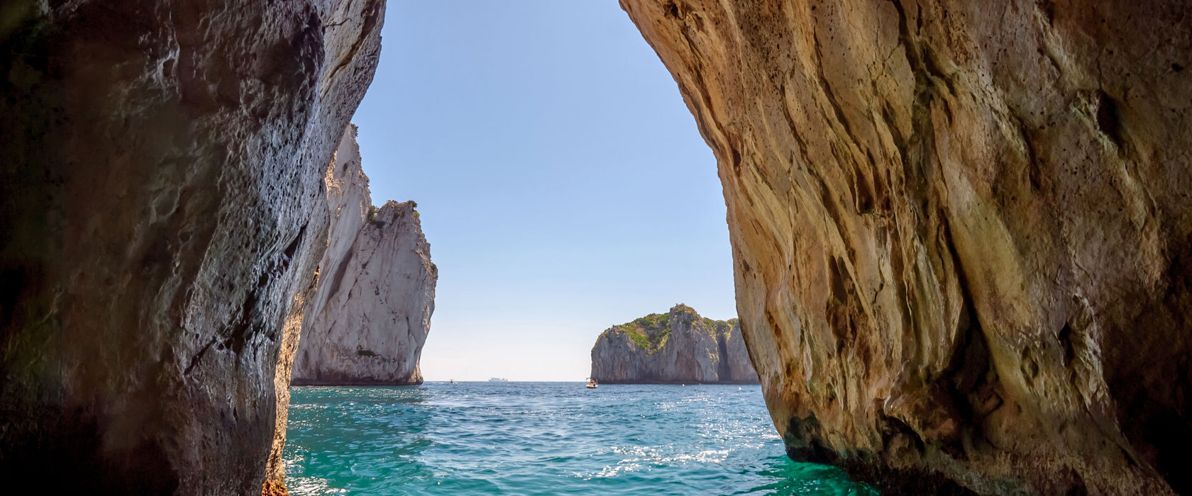 Felstor im Meer, Glasbild Panorama