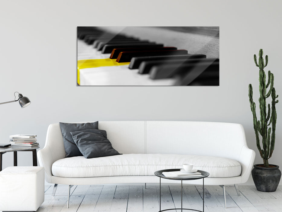 schönes Klavier mit gelben Tasten, Glasbild Panorama