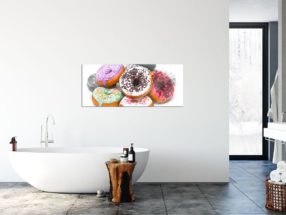 Donut mit Glasur und Liebesperlen, Glasbild Panorama