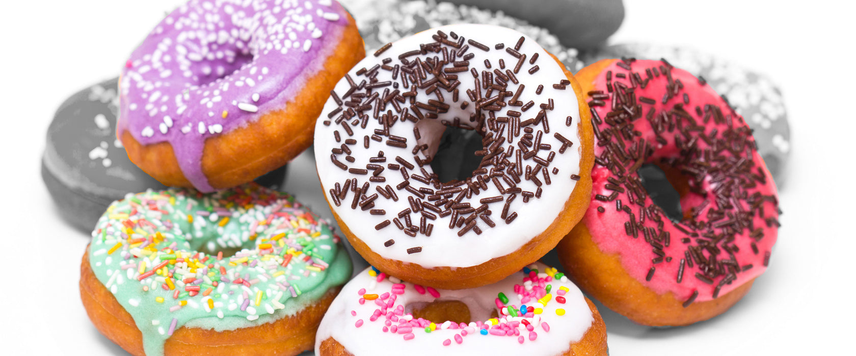 Donut mit Glasur und Liebesperlen, Glasbild Panorama