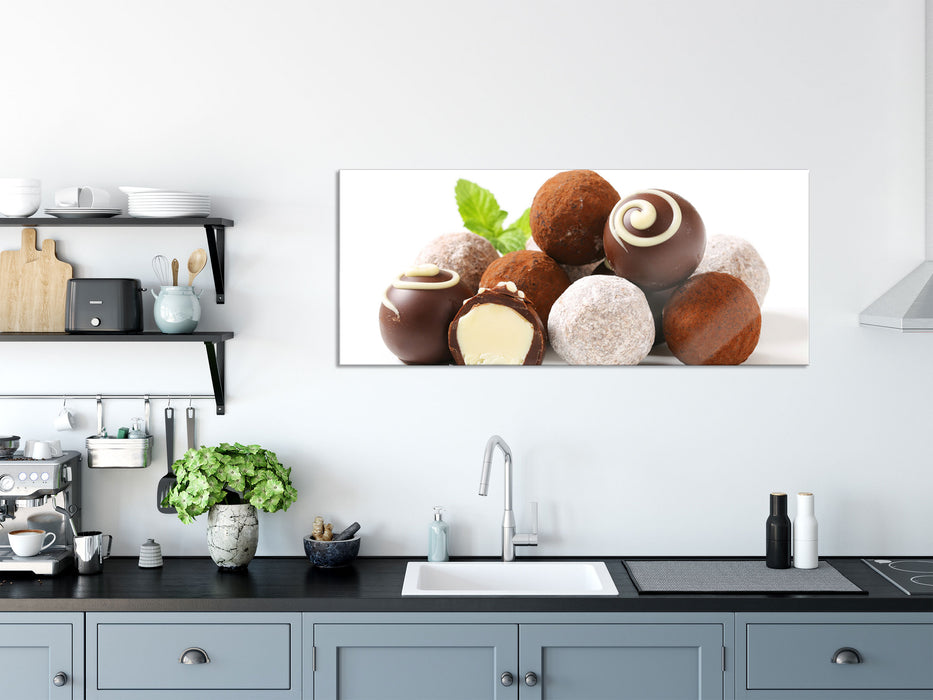 Edle Trüffelpralinen, Glasbild Panorama