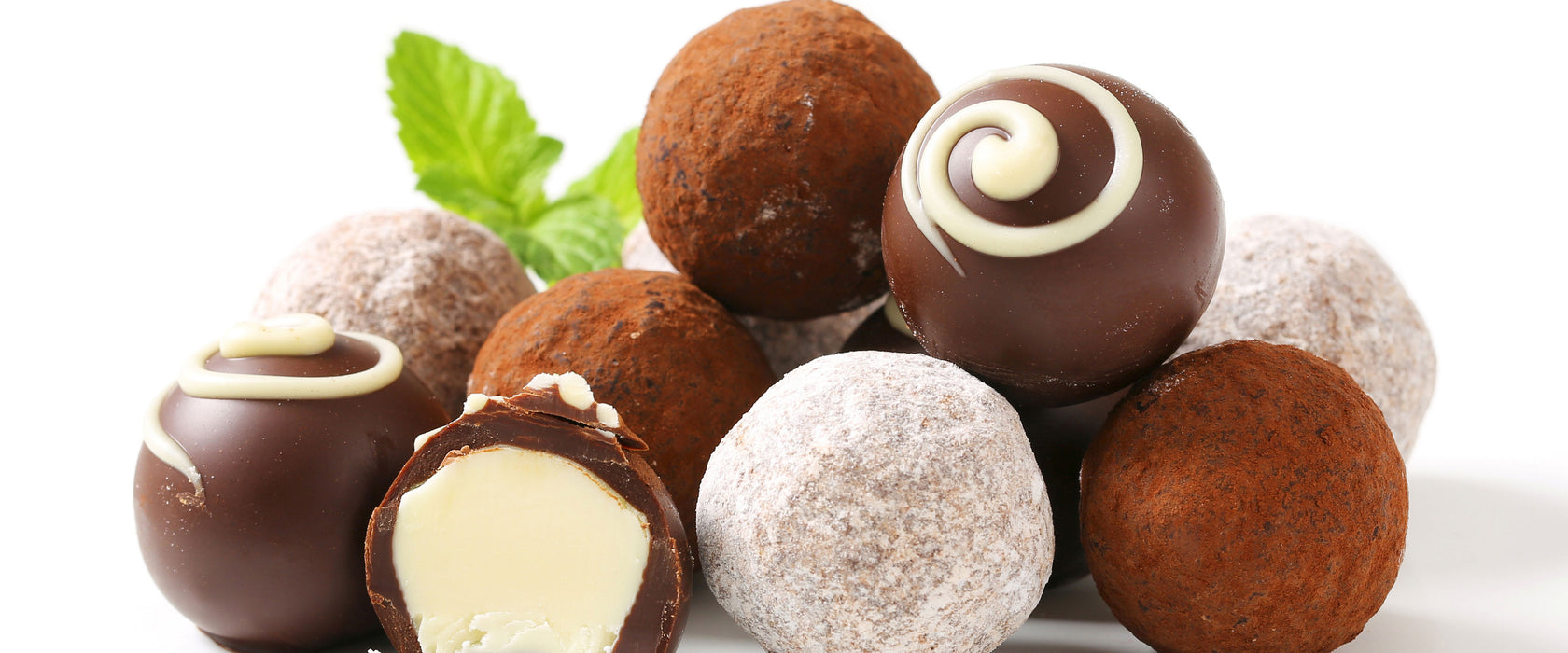 Edle Trüffelpralinen, Glasbild Panorama