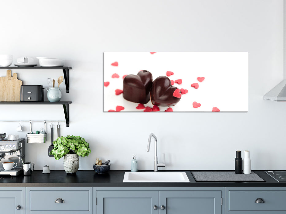 Schokoladenherzchen, Glasbild Panorama